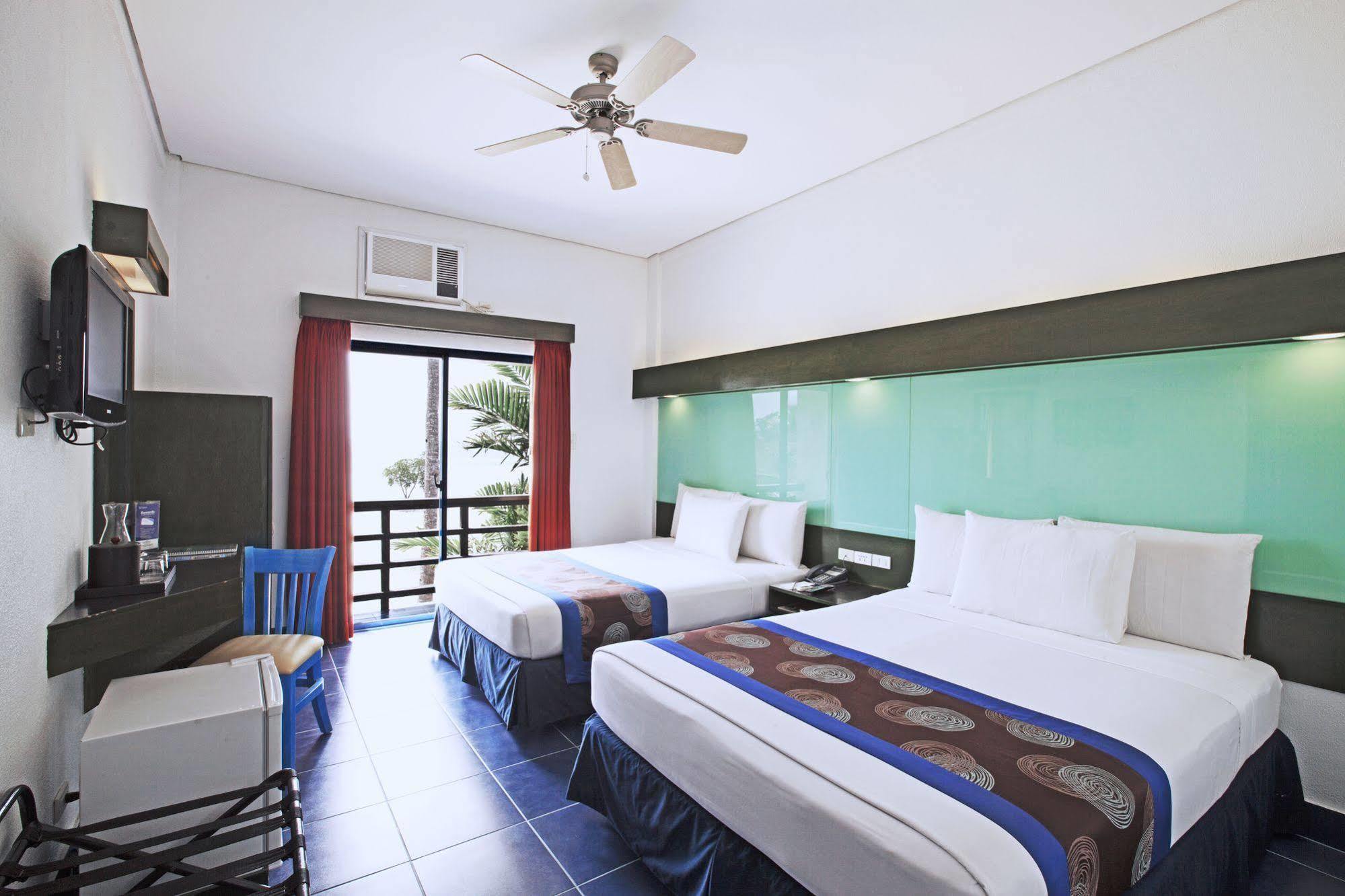 Microtel By Wyndham Puerto Princesa Buitenkant foto